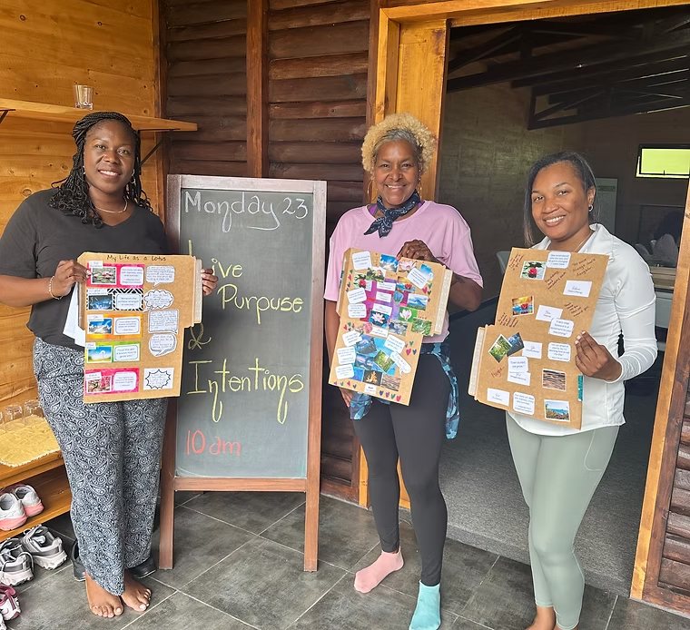 Guests sharing vision boards during a morning intention-setting session