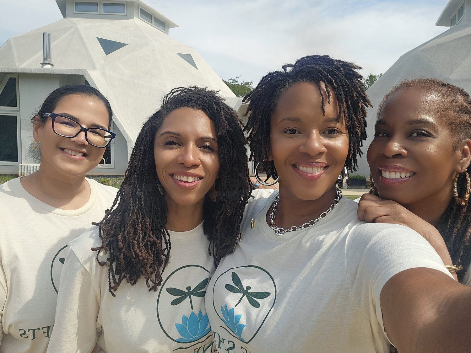 Guests in Serene Shifts tees at the retreat domes